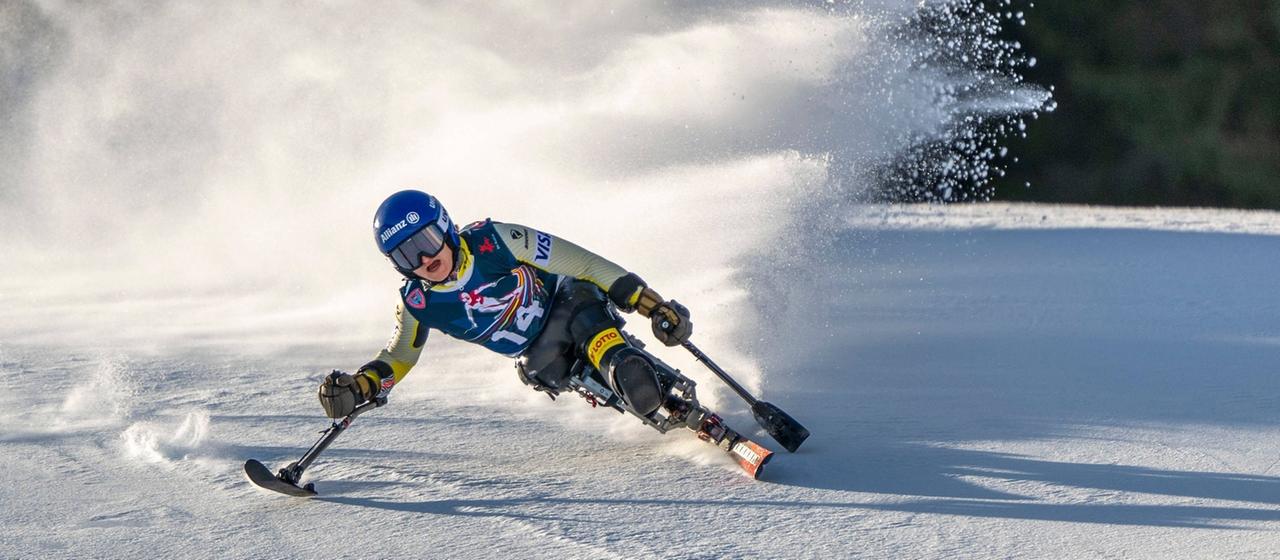   Anna-Lena Forster skis down the slopes on her monoski.