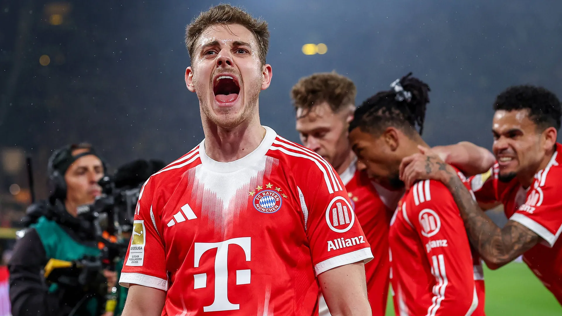 Enforced: Josip Stanišić and Bayern celebrate in the game at Borussia Dortmund.