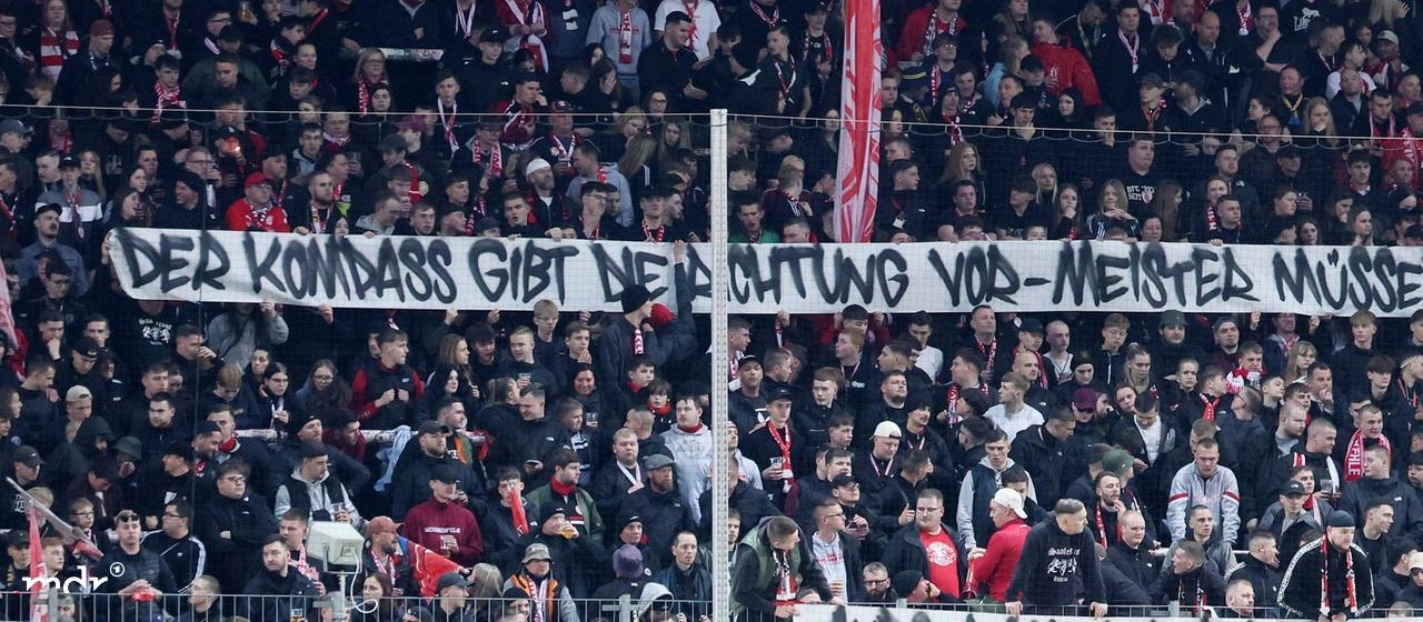 Fans of Halleschen FC show a poster. Masters must rise. Regional league reform, promotion reform. , For editorial use only. Editorial use only. , DFB NOFV regulations prohibit any use of photographs as image sequences and or quasi-video. , *** Hall, 