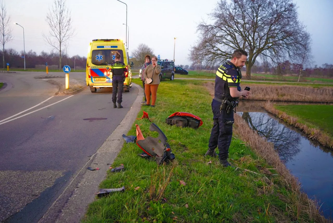 Serious collision between scooter and car in Sprang-Capelle (photo: Erik Haverhals / Heitink Press Agency).