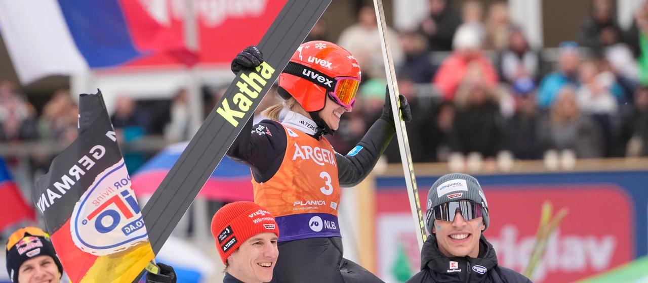 Katharina hcmid is celebrated after her last jump