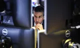 A trader on Wall Street in New York. While the extent of the current 'Iran crisis' does not yet seem to have penetrated the stock markets, the bond markets tell a different story. 