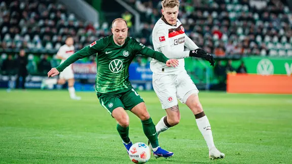 Game scene from the Bundesliga game Wolfsburg against St. Pauli | IMAGO / Beautiful Sports Game scene from the Bundesliga game Wolfsburg against St. Pauli