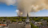Aerial photo of the large wildfire on the military training area near 't Harde.