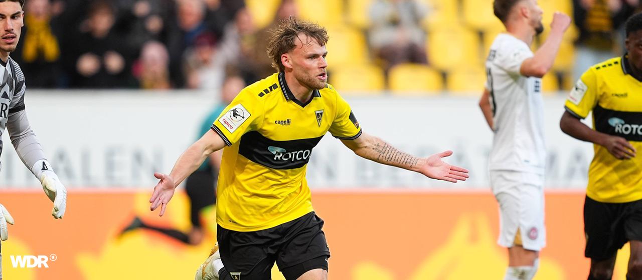 Aachen's Mika Schroers celebrates after his goal to make it 1-0 