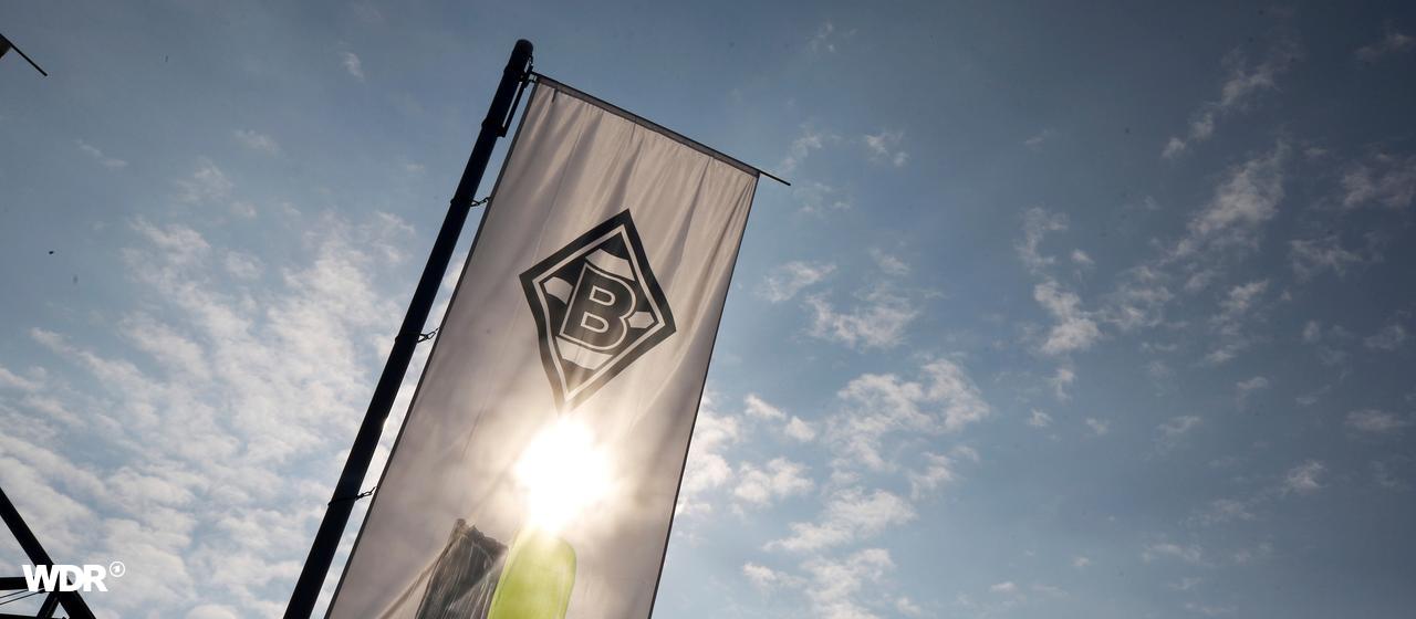 A flag with the Borussia Mönchengladbach logo flies at Borussia Park