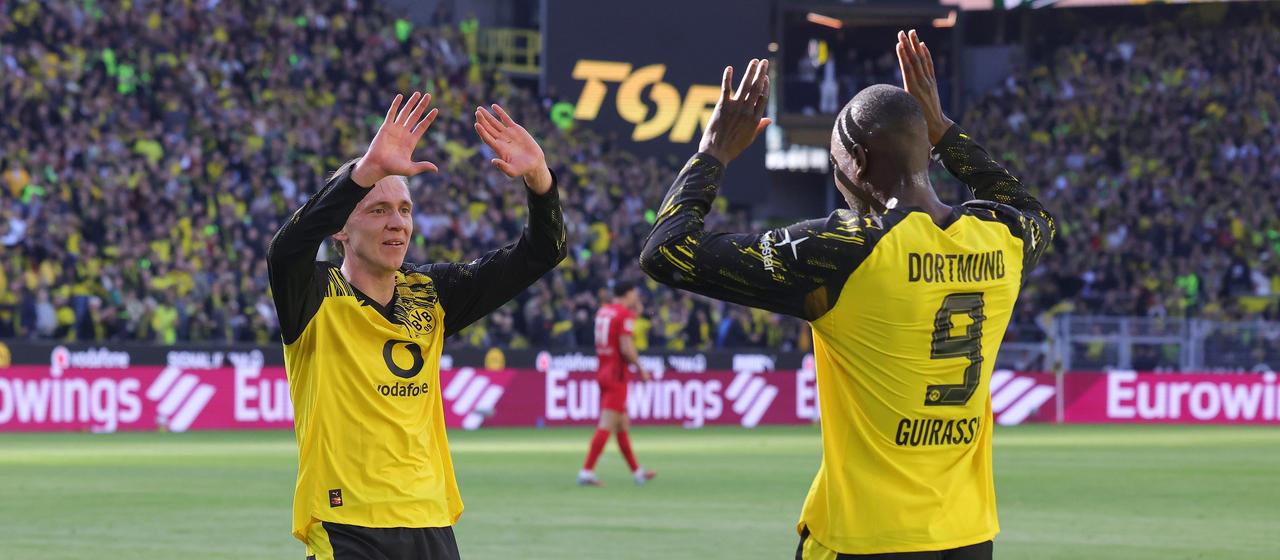 Serhou Guirassy celebrates with Maximilian Beier