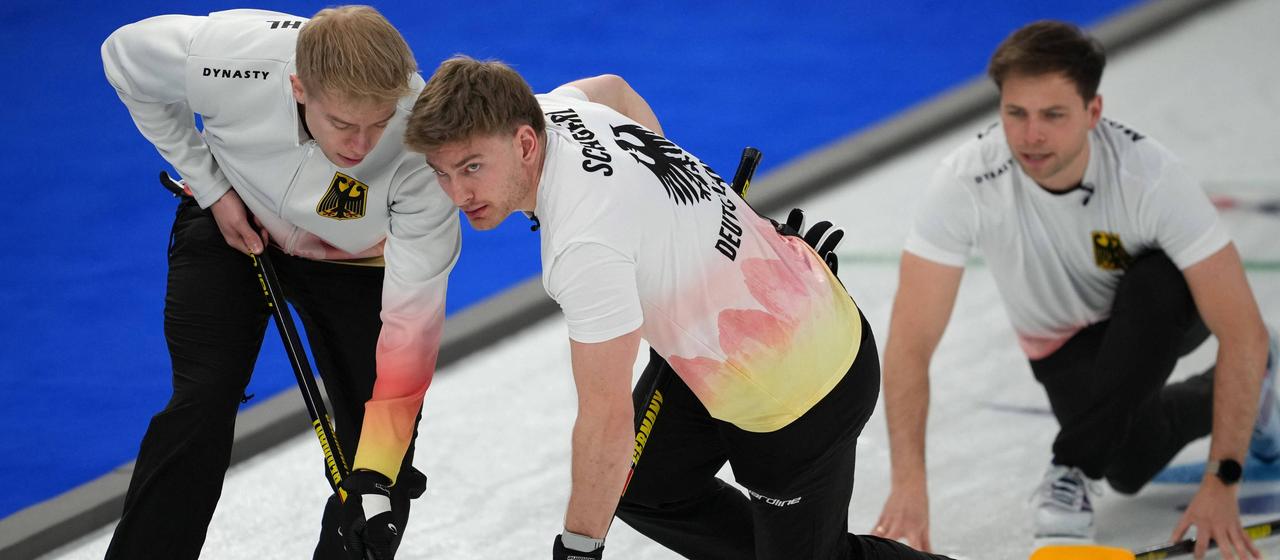 The German curling team in action