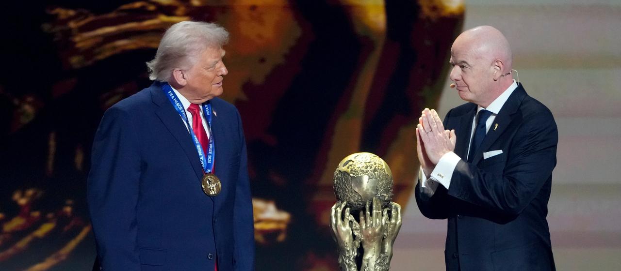 FIFA President Gianni Infantino presents Donald Trump with the FIFA Peace Prize