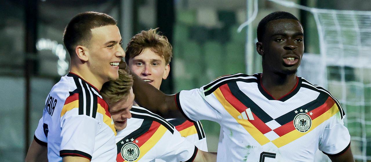 Said El Mala, Anton Kade and Joshua Quarshie celebrate a goal
