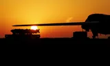 epa12874709 US Air Force JDAM precision-guided munition and a Rockwell B-1 Lancer heavy bomber sit on the tarmac as the sun rises above RAF Fairford airbase in Gloucestershire, Britain, 08 April 2026. The US and Iran agreed to a two-week conditional ceasefire with the condition of temporary reopening of the Strait of Hormuz, announced by US President Donald Trump. EPA/TOLGA AKMEN