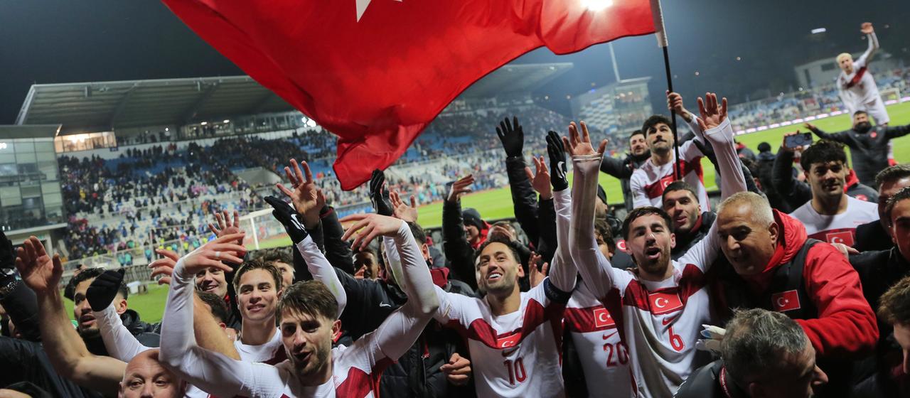 The Turkish team celebrates their participation in the World Cup