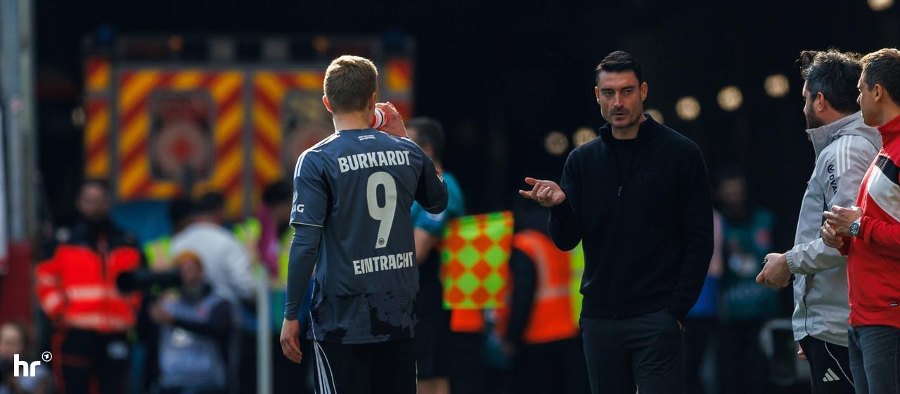 Eintracht coach Albert Riera and Jonny Burkardt