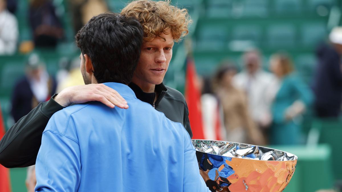 Alcaraz and Sinner hug after the final