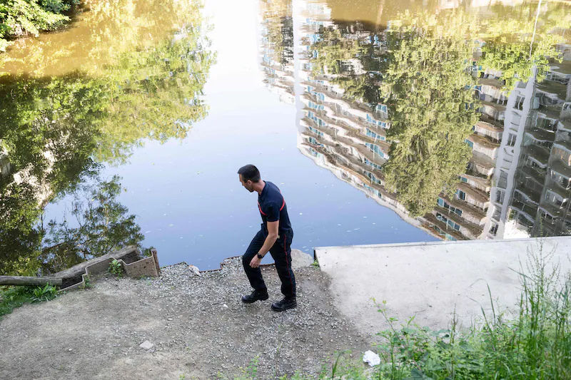 Detectives at the spot where the 11-year-old boy was found.