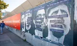 Posters questioning the trustworthiness of Big Tech on a wall in San Francisco. Photo Getty Images
