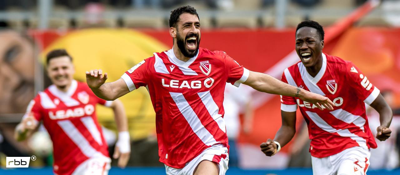 Energie Cottbus' Tolga Cigerci celebrates his late winning goal in the game against SV Wehen Wiesbaden