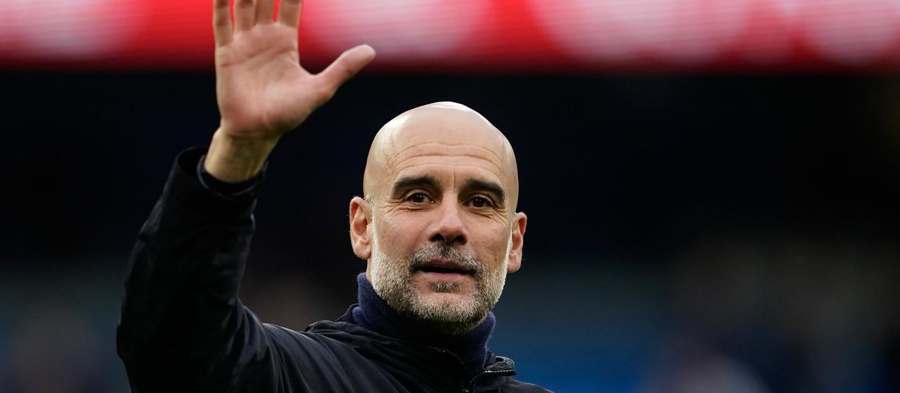 Pep Guardiola waves goodbye