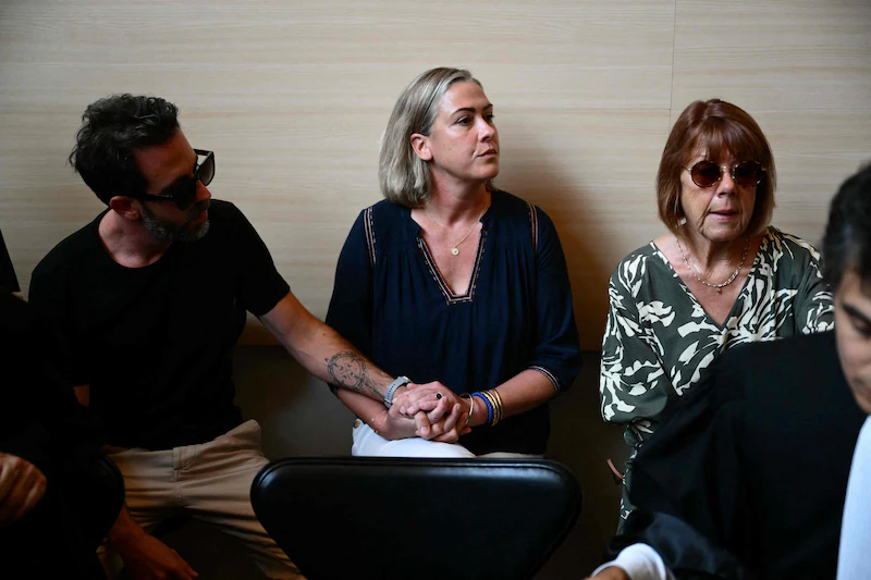 Gisèle Pelicot (right) sits in court next to her daughter Caroline Darian (center) and her son (left) during her husband's trial in 2024.  