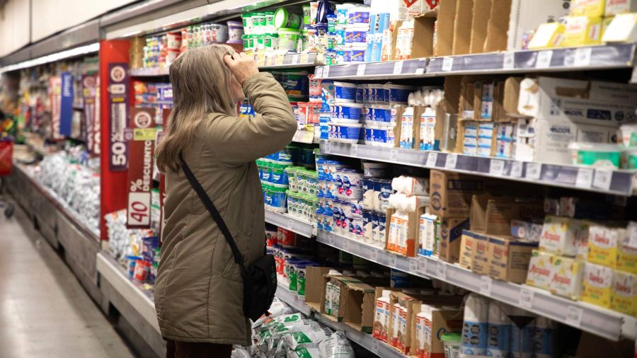 Photogallery A woman observes the prices of dairy products in a supermarket, in the city of Buenos Aires. Argentina