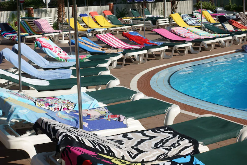 Laying a towel is a sport for many on holiday.