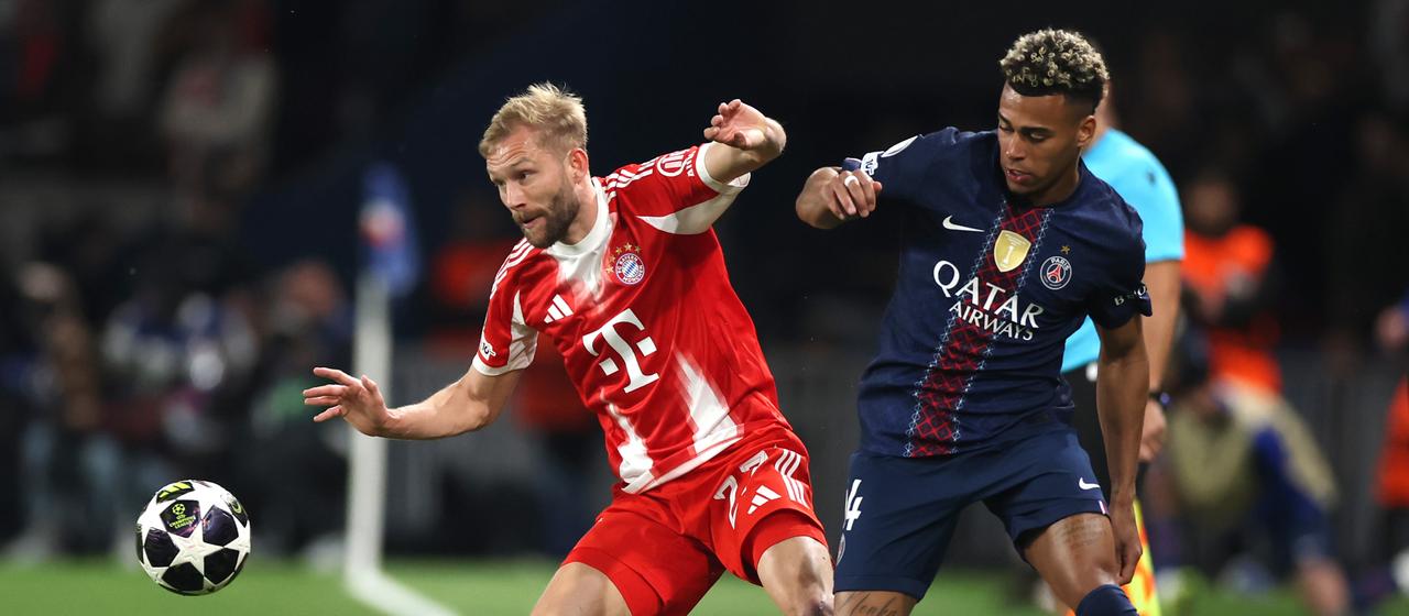 Munich's Konrad Laimer in a duel with PSG's Desire Doue