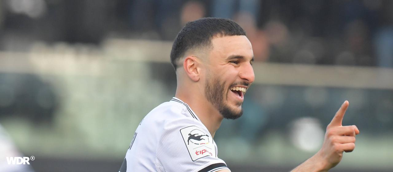 Oualid Mhamdi celebrates his own goal