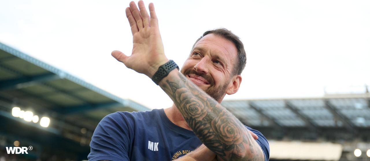 Mitch Kniat waving