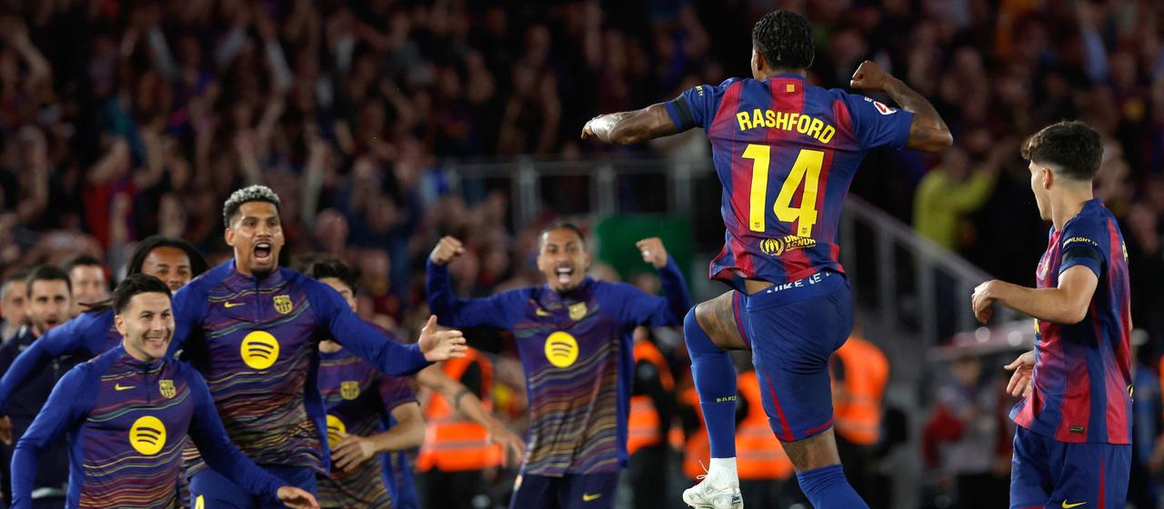 Barcelona's Marcus Rashford (2nd from right) celebrates his opening goal in the Clasico with his teammates
