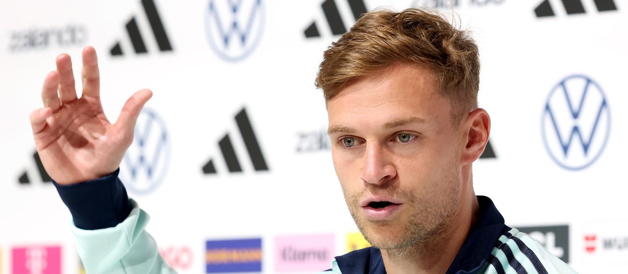 Germany's Joshua Kimmich speaks at the press conference