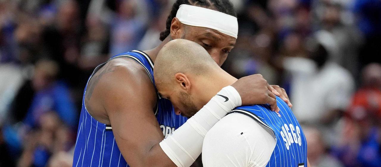 Orlando's Wendell Carter Jr. (l.) and Jalen Suggs console each other after the playoff exit