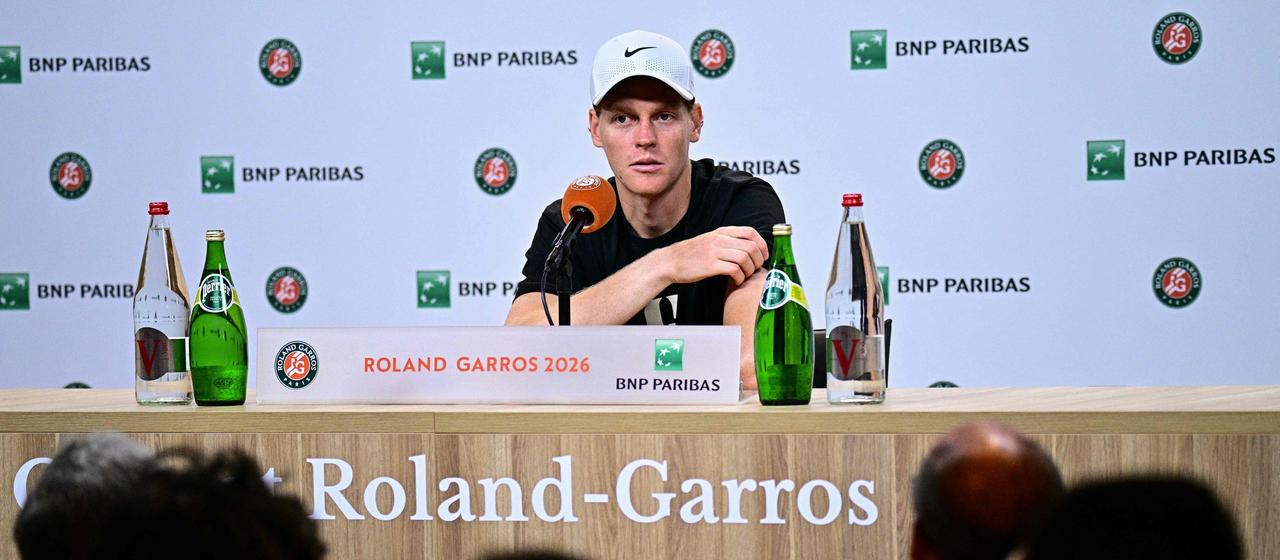 Jannik Sinner speaks to the media