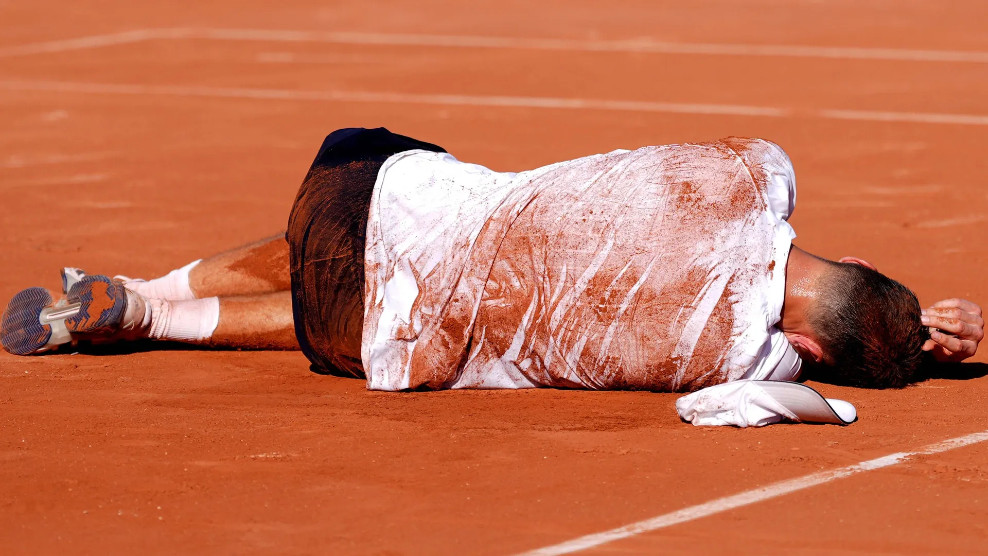 On the ground: Jakub Menšík after his match against Mariano Navone.