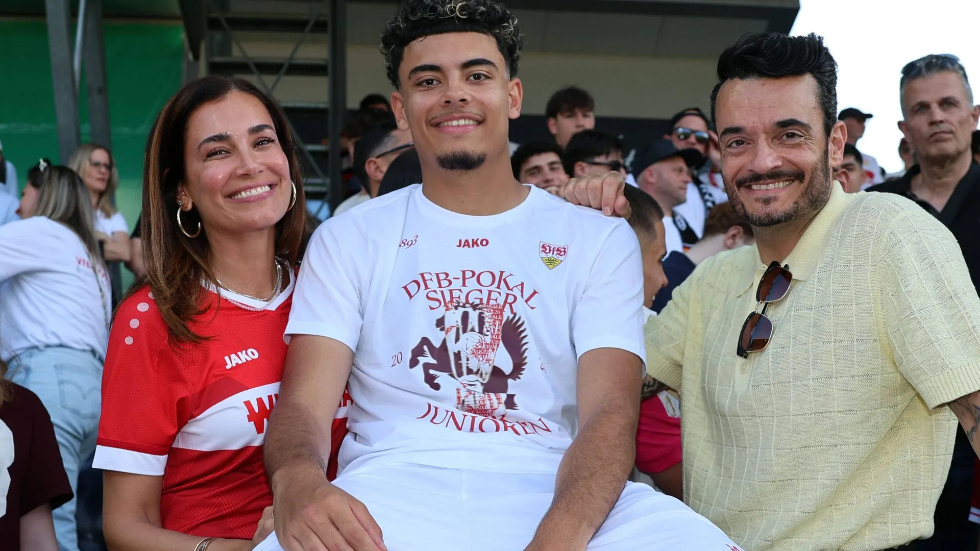 Proud parents: Jana Ina (left) and Giovanni Zarella (right) with son Gabriel after winning the cup final. Proud parents: Jana Ina (left) and Giovanni Zarella (right) with son Gabriel after winning the cup final.