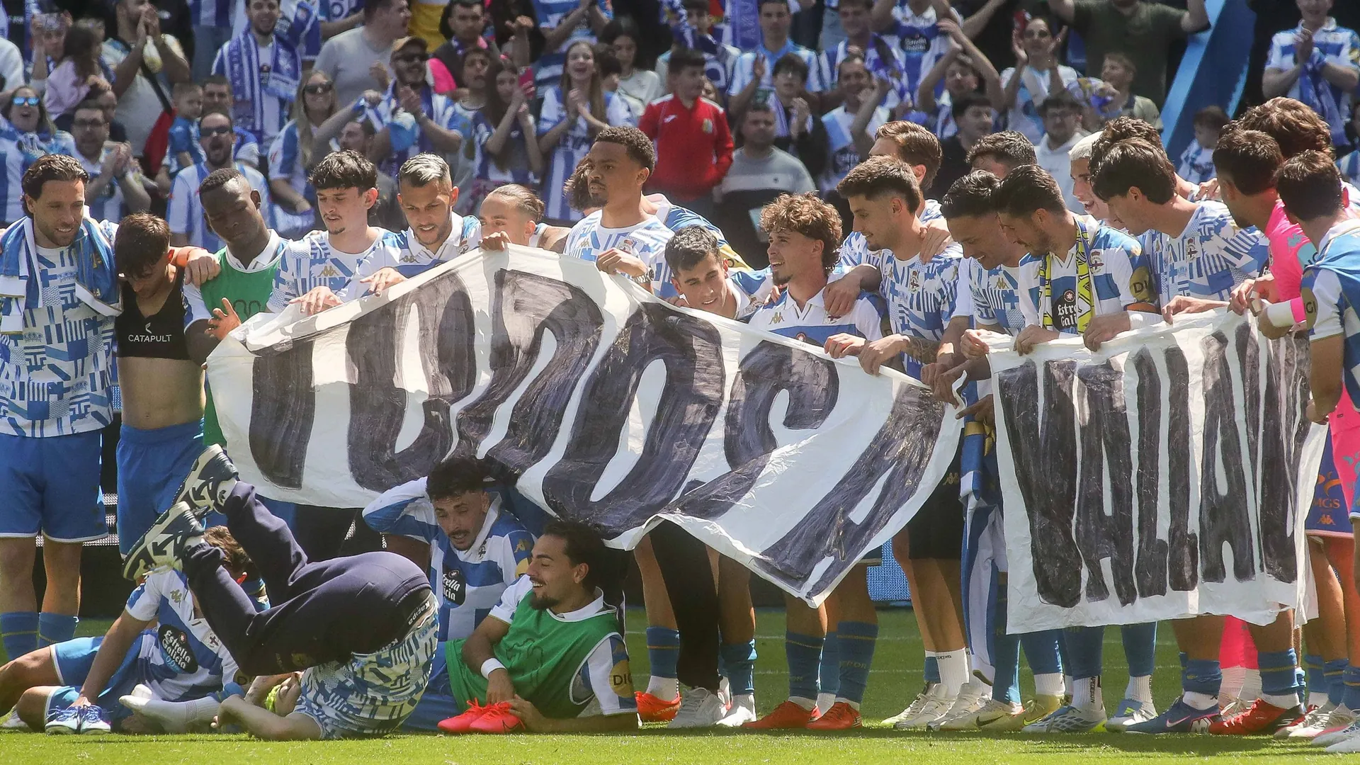 Back in La Liga: The players of Deportivo La Coruña are celebrating promotion. Back in La Liga: The players of Deportivo La Coruña are celebrating promotion.