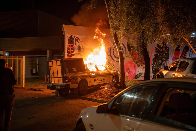 A police van has been set on fire during the Alice Springs riots.