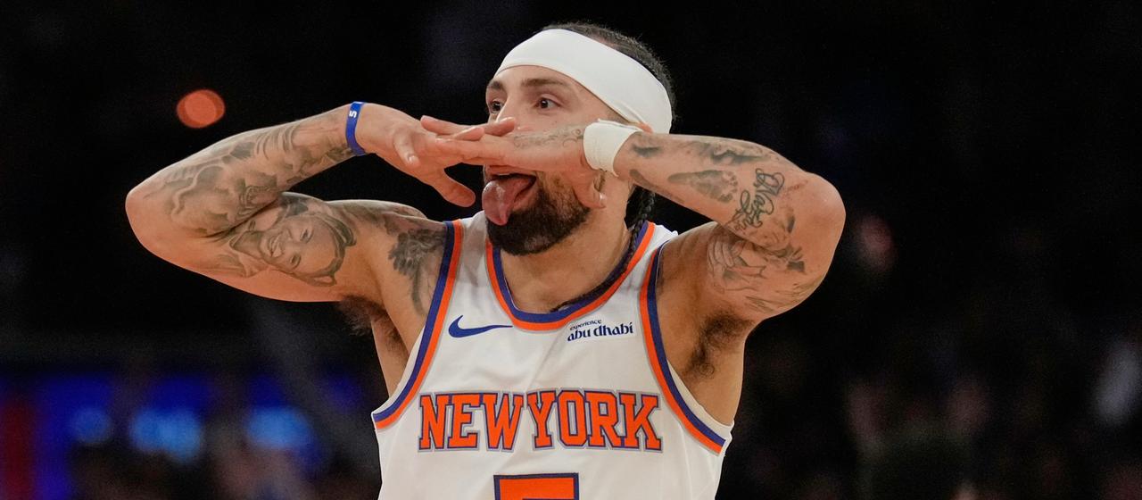 Jose Alvarado of the New York Knicks celebrates in the game against the Philadelphia 76ers