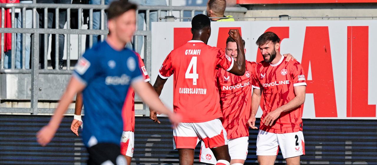Kaiserslautern's Simon Asta celebrates his goal
