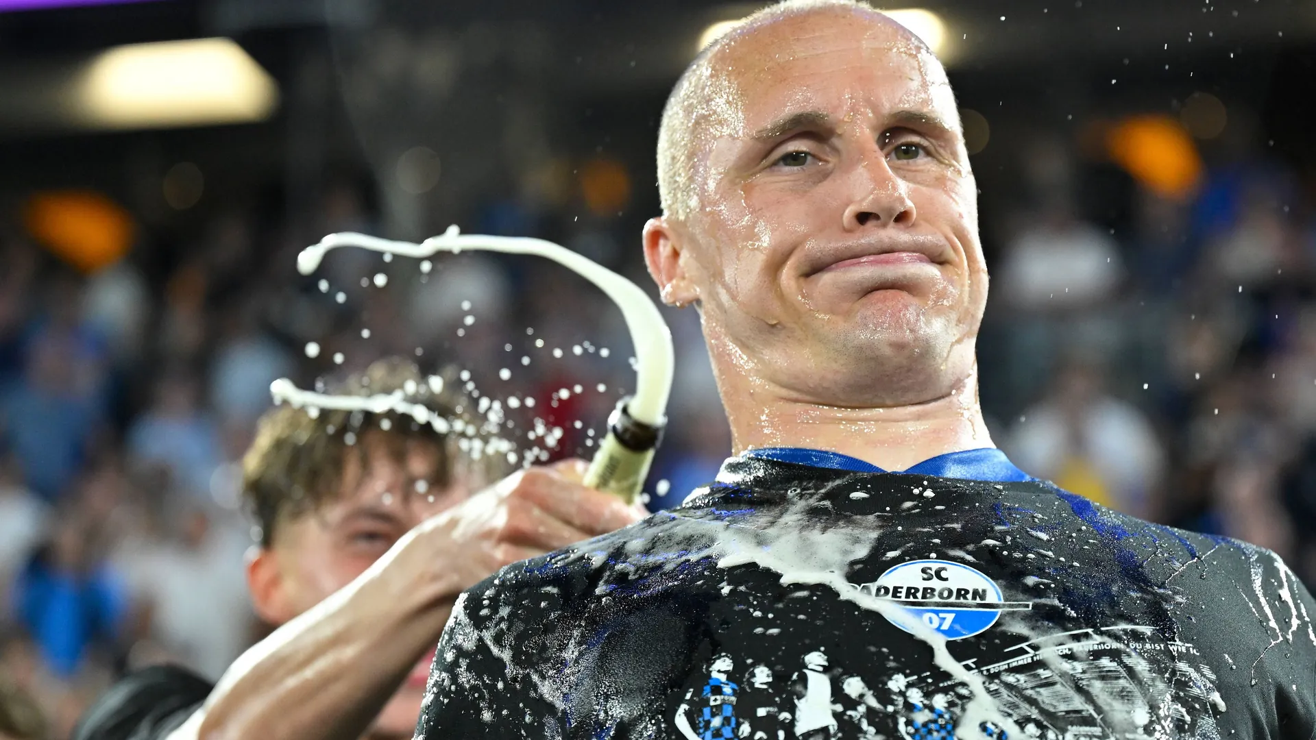 Sven Michel is poured with beer: There are no limits for the Paderborn striker these days. Sven Michel is poured with beer: There are no limits for the Paderborn striker these days.