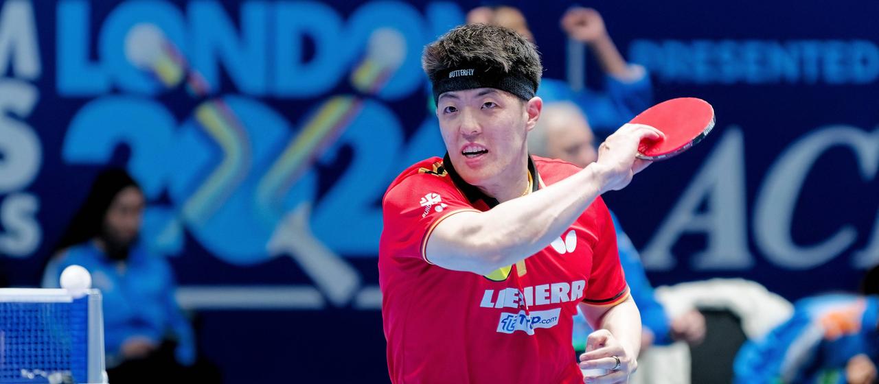 Dang Qiu during a match at the World Team Table Tennis Championships