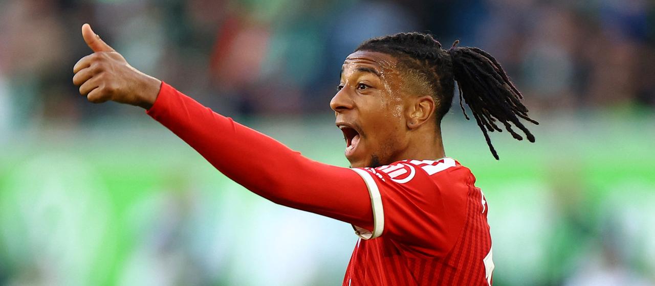 Michael Olise celebrates his winning goal in Wolfsburg
