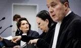 Inez Weski (middle) between lawyers Geert-Jan Knoops and Carry Knoops-Hamburger in the Rotterdam court.
