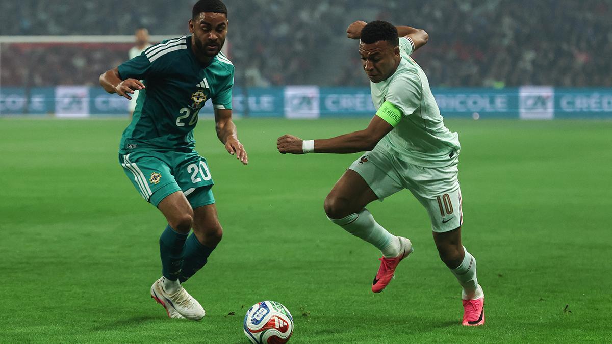 Kylian Mbappe with France in action against Northern Ireland's Brodie Spencer