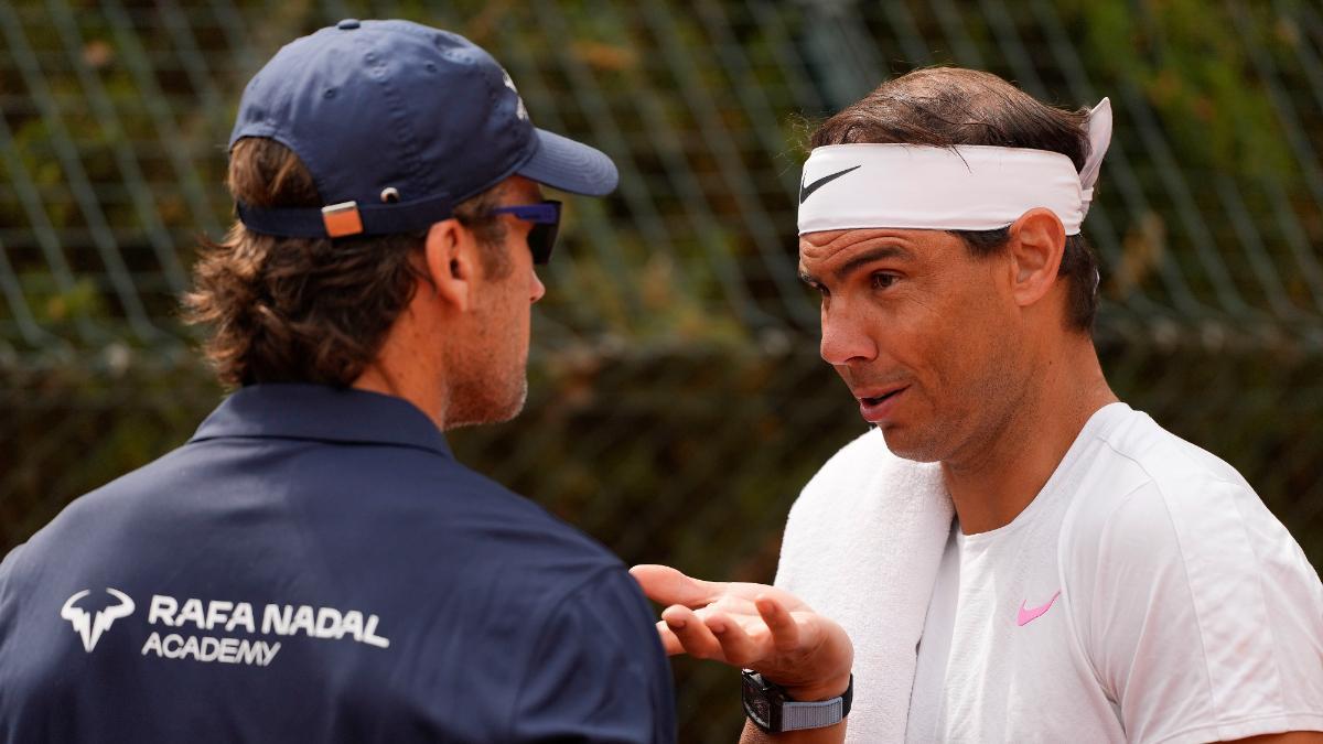 Rafa Nadal with his coach, Carlos Moyá, in training