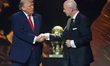 Donald Trump shakes hands with FIFA president Gianni Infantino after receiving the first FIFA Peace Prize during the World Cup draw in Washington.