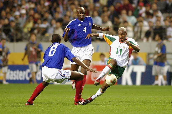 El Hadji Diouf passes Marcel Desailly.