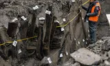 Archaeologists at work in the enormous construction pit in which RottaNova will be built, full of remains of ancient locks, quays and revetments.  