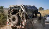 An Israeli army vehicle on patrol in the northern border area with Lebanon on June 9.