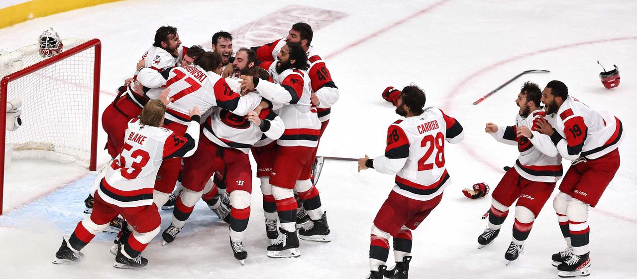 The Carolina Hurricanes celebrate the title