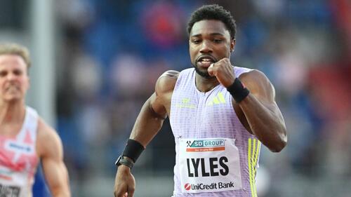 Athletics: Olympic champion Lyles sets new world record